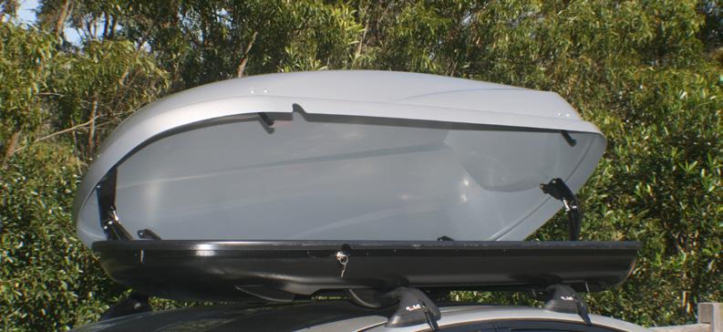 Travel Twin This is a car roof box with a clear and slender shape.