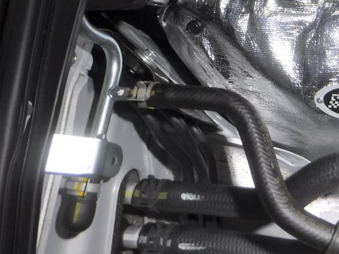 The additional hoses in Photo 3-2 are the intercooler cooling hoses for the TDR Edelbrock Supercharger and catch can assembly. 2.