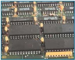 DIL integrated circuits, an SIL resistor network and bead tantalum capacitors (c.