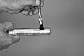 4. LUBRICATE BOLT THREADS: Apply a thin coat of Victaulic lubricant or silicone lubricant to the bolt threads. 5.