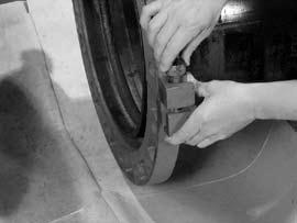 3. ADD SECOND SEGMENT: Add the second segment by inserting the draw bolts (provided) into the flange adapter with the nuts (provided) loosely and uniformly
