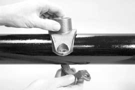 Thread a flange nut loosely onto the end of the bolt (nut should be flush with end of bolt) to allow for the swing-over feature. 5.