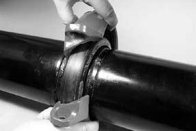 ASSEMBLE HOUSINGS: Insert one bolt into the housings, and thread the nut loosely onto the bolt (nut should be flush with end of bolt) to allow for the swing-over