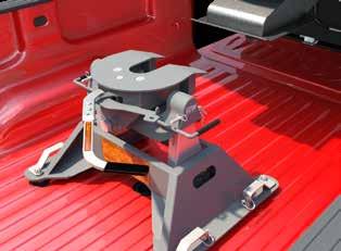 Adjust the height of the fifth wheel trailer using the jack so that the kingpin plate is
