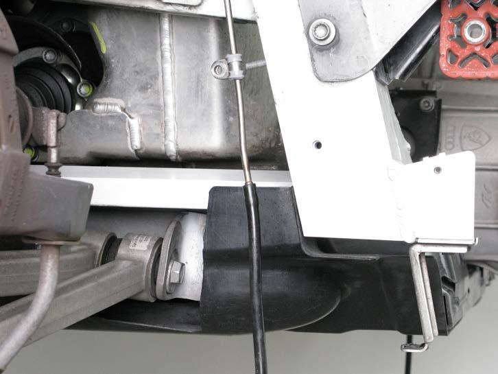 23. Remove the original vacuum rubber tubes off the metal vacuum tubes on both sides of the vehicle (Figure 32).