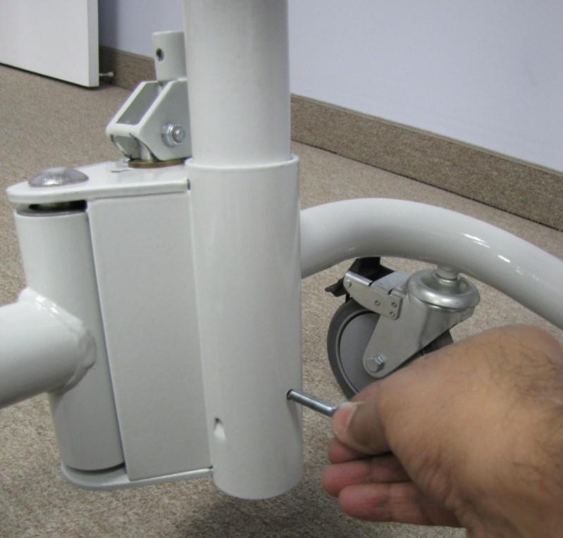 Insert the mast locking Screw into the bottom hole of the base assembly, and securely tighten as shown in Figure 7 and 8.