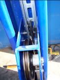Take off the stop plate of the big pulley shaft on one end of cross bar. (See Fig.