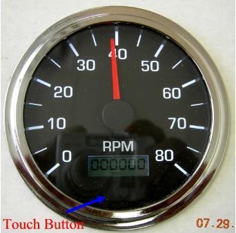 Tachometer Setup Menu The default setup will show an hour meter on the digital display. However there is an optional display for RPM on the LCD.