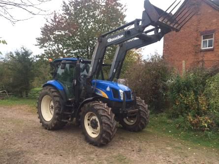 & VEHICLE 2007 New Holland TS125A 4WD Tractor With Quicke Q55 Loader With Bucket, Spike and Muck Fork to Fit Sumitomo SH60 DX-2 Excavator on