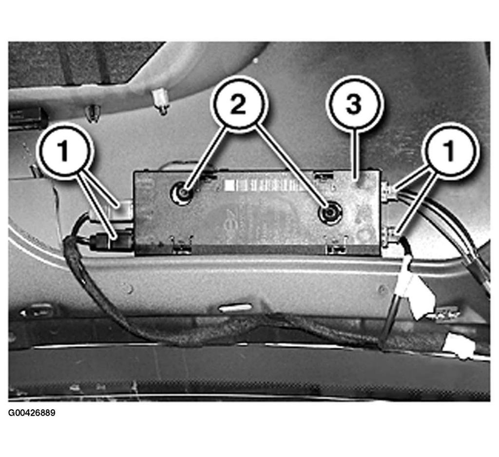 Fig. 11: Locating Amplifier Retaining Screws 65 24 010 REMOVING AND INSTALLING/REPLACING ANTENNA AMPLIFIER Remove rear right trim.