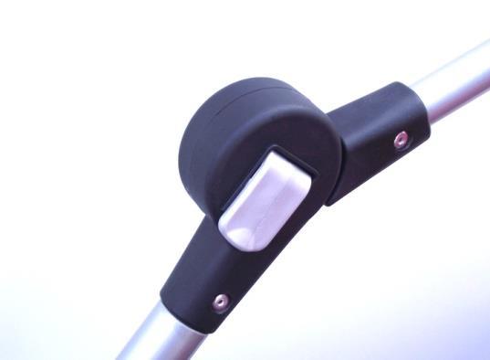 Adjusting the push handle height/ folding the chassis The height of the pushing handle is adjustable, and