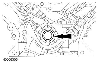 10. NOTICE: If one or both of the tensioner mounting bolts are loosened or removed, the tensioner sealing bead must be inspected for seal integrity.