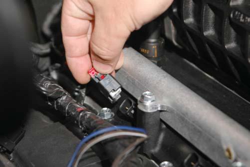 Connect the MAP sensor plug at the rear right hand side location of
