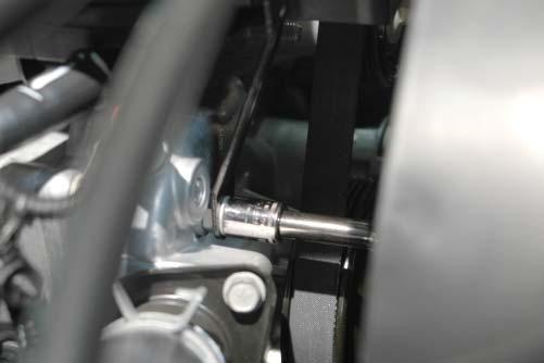 21. Dismount the additional throttle body wire