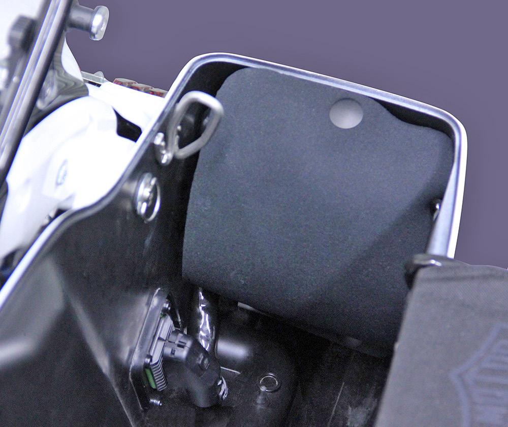 Install the supplied fabric cover over the saddlebag amplifier using the plastic push-plugs. (Photo-G) 16. Reinstall the fairing, windshield, fuel tank and seat.