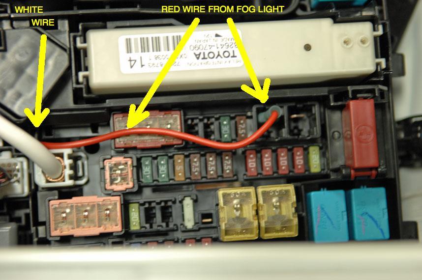 In the hood area, locate the red 12v wire from fog light harness to inside the fuse block.