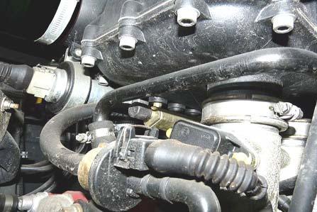 7), and the other is on the rear of the injector rails (the easiest one to access is on the