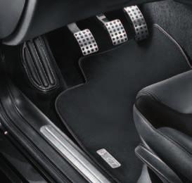 Black dominates with sports leather seats, leather steering wheel and black