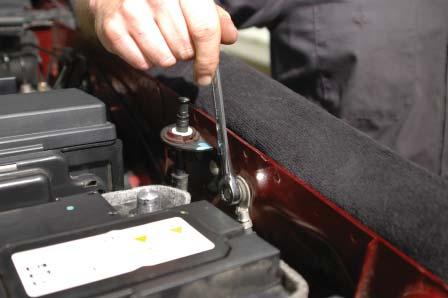 Remove the ground bolt on the engine compartment driver side fender wall by the negative battery