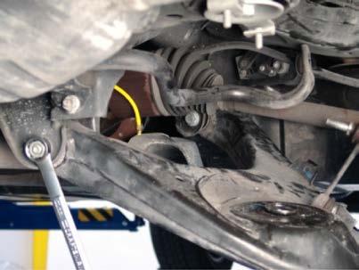 5. LOOSEN BUT DO NOT REMOVE THE TWO REAR BOLTS HOLDING THE CONTROL ARM,