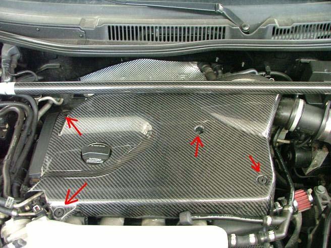 Step One: Remove Engine cover. Engine cover Hold Down Screws are marked above.