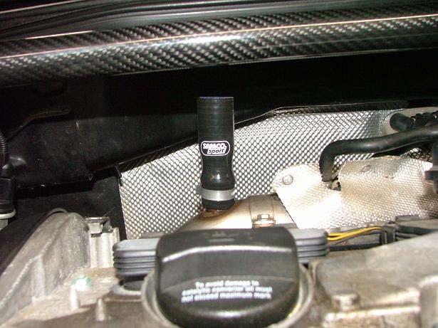 Install the supplied silicone adapter as shown and secure
