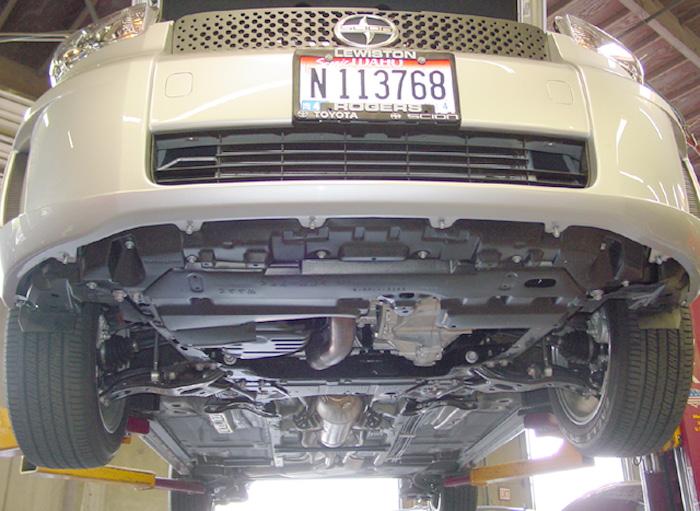 Start by removing seven plastic fasteners attaching the radiator cover to the grille and