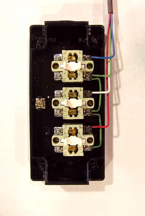 Use a short pieces of green wire from the 4-conductor Thermo Wire and jumper between one of the N/O terminals on the Open button and one of the N/O terminals on the Close button and then from the