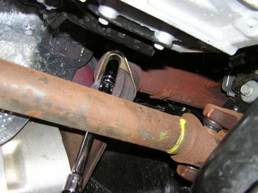 o Now that the cross-member has been removed, loosen but do not remove the nuts (2 on each side) on both the left and right side down tubes where the exhaust system is attached to the stock cast