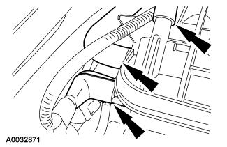 8. Disconnect the engine wiring harness and position it out of the way. 9.