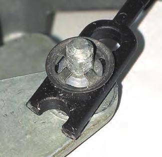 housing at the lever s innermost position (See Photo 3, below). Secure the cable converter lever actuator rod to the OEM cable mounting stud using a 3/6 push-on ring as shown in Photo 4, below.