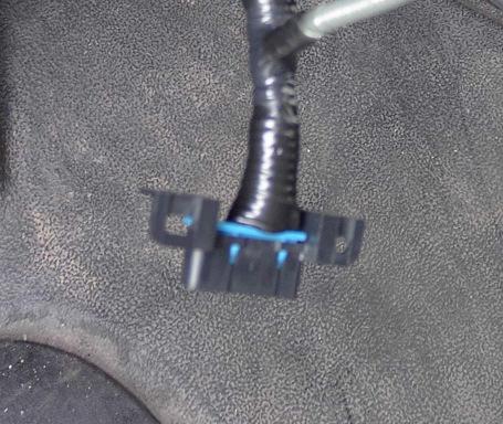 to the upfitter wire provided by Ford near the bottom of the dashboard center stack
