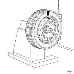 a The wheel is fitted on the wheel balancer as follows: - (5) ring, - (6) wheel balancer back-plate, - (7) wheel tightening device (certain alloy wheels require a device 200 mm in diameter to ensure
