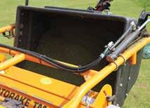 The weight of the collection box and material is carried by the main frame on the front roller and independent from the reel, so when in use the additional weight does not force the reel to scarify