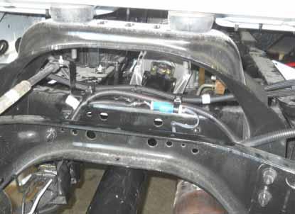 Continue securing the underhood to the OEM to the rear and zip tie as necessary.