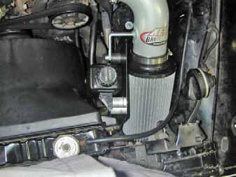 Check for clearance of power steering line under the