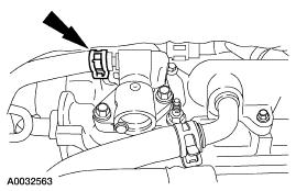 9. Lower the transmission enough to allow access to the EGR valve. 10.