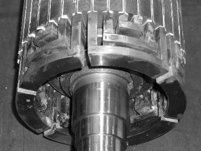 439 2 Figure 2a, A BDFM rotor with a 6-pole, 3 loop, nested winding. This is Rotor 1 in the D18 machine. Figure 2b, Two D18 BDFM rotors with 6-pole, 4 turn, two-layer windings.