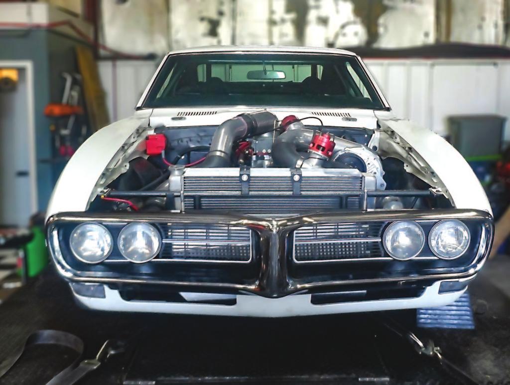 WORDS: Scott Parker PICTURES: By Redline Motorsports IT S ELECTRIC SWITCHING TO HOLLEY EFI YIELDS BETTER DRIVABILITY AND MORE POWER FOR A BOOSTED 68 FIREBIRD I t s been said many times, and often it