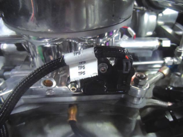 New plug wires were cut to fit. By switching from a single coil and distributor, much more spark energy is available.