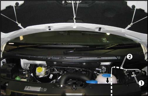 1. In the engine bay, locate the vehicle battery (1). 2.