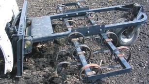 Cultivating out weeds along shelter belts and orchards are just two ways to save time and labor with this attachment.
