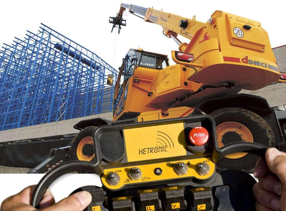 The optional but highly recommended Radio Remote Control System allows an operator to control boom functions using a compact, wireless remote control pendant from outside