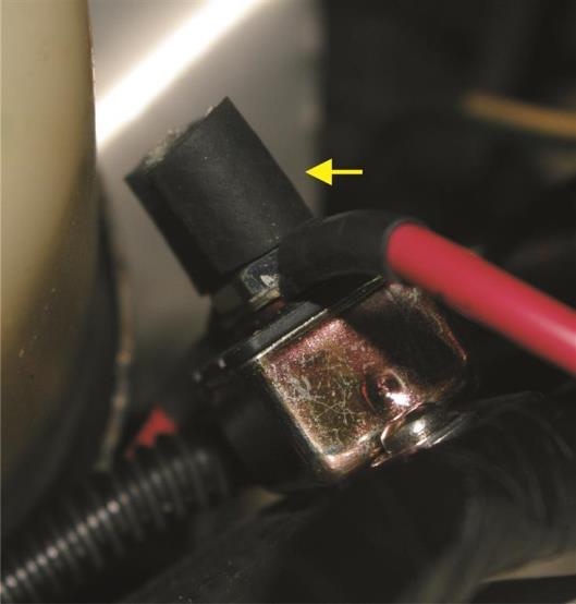 Because the terminals on the breaker are exposed and carry full battery voltage, I insulated them by adding some 3/16 inch ID rubber hose to the terminals (see Figure 6)