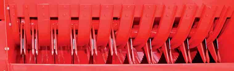 As a result of the central splitting and off-set mounting of the feeder-tine banks, the load is distributed to the cam