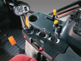 On the E-Plus version, the 4 auxiliary valves are electro-hydraulically controlled by the joystick controls located on the multi-function armrest (1 and 2) (fig. F).