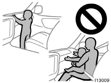 Do not allow a child to stand up, or to kneel on the front passenger seat. The airbag inflates with considerable speed and force; the child may be killed or seriously injured.
