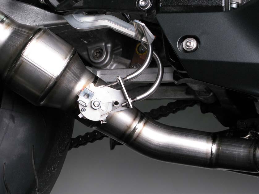 www.akrapovic.com 8. For street legal Racing and Evolution only: remove the stock exhaust cables off the stock exhaust valve and install them back onto the exhaust valve servo motor (Figure 24).