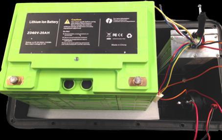 Inside the Battery Box, locate the three connection points not connected already including a (i) yellow plastic block, (ii) rectangular connector with a white, black and red wire and (iii) a square