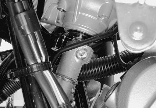 Power Assisted Steering System: 6C-52 Install the cable guide (1) and tighten the bolts (2) to the specified torque. Install the front brake hose union (5) and throttle cable (6) to the cable guide.